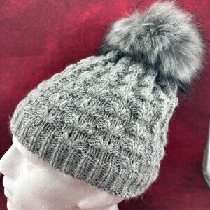 GRAY CABLE KNIT BEANIE WITH FAUX FUR POM POM